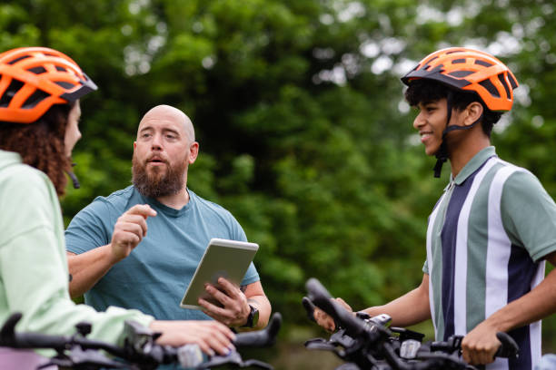 Ride leader briefing a group before departure
