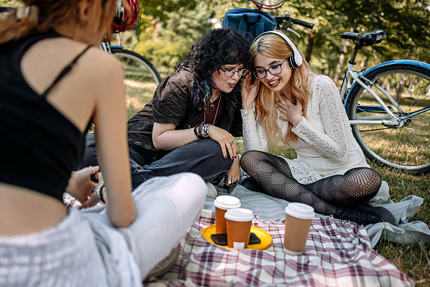 Group of cyclists enjoying coffee after a ride